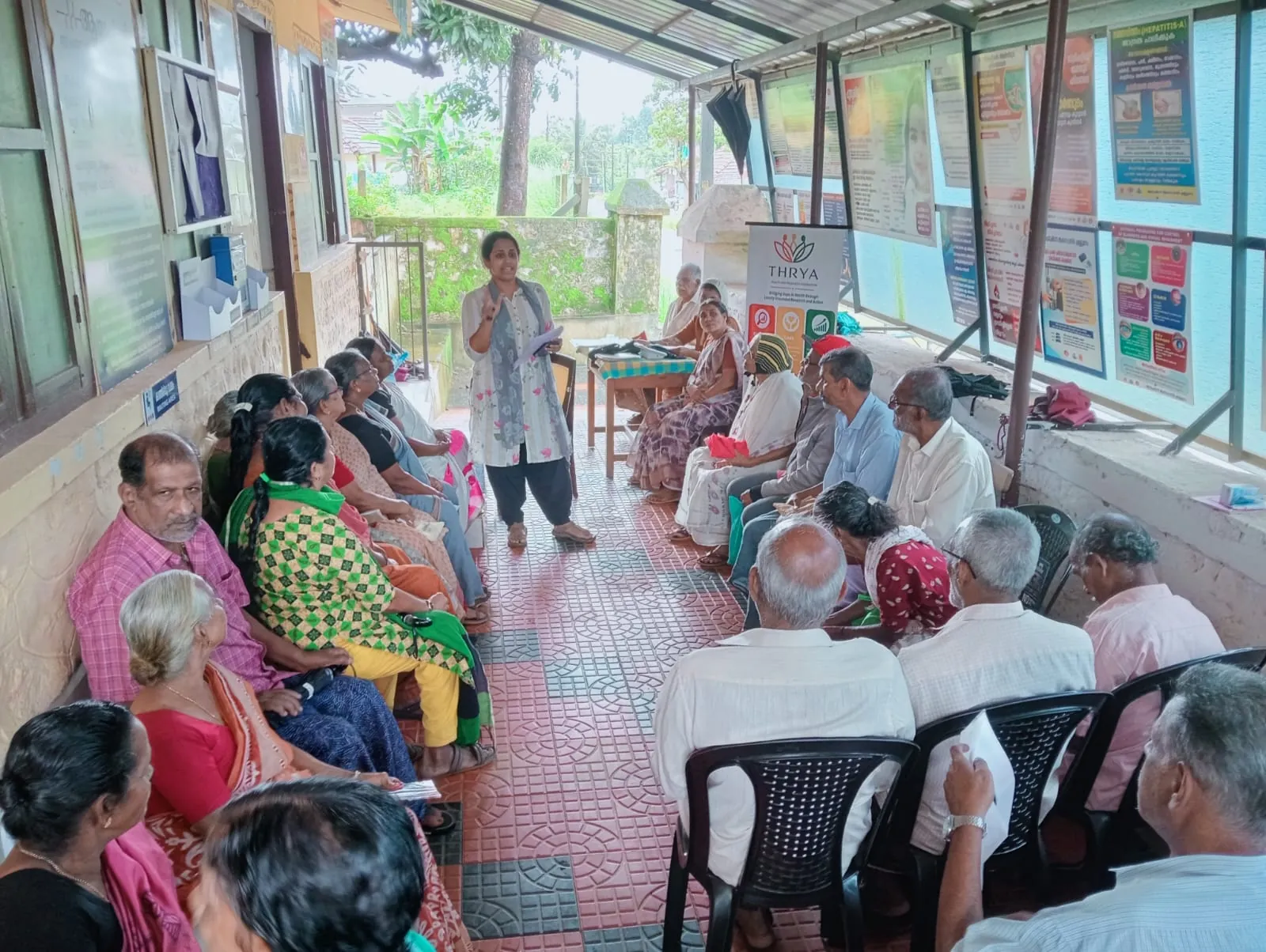 Local health worker consulting with a resident